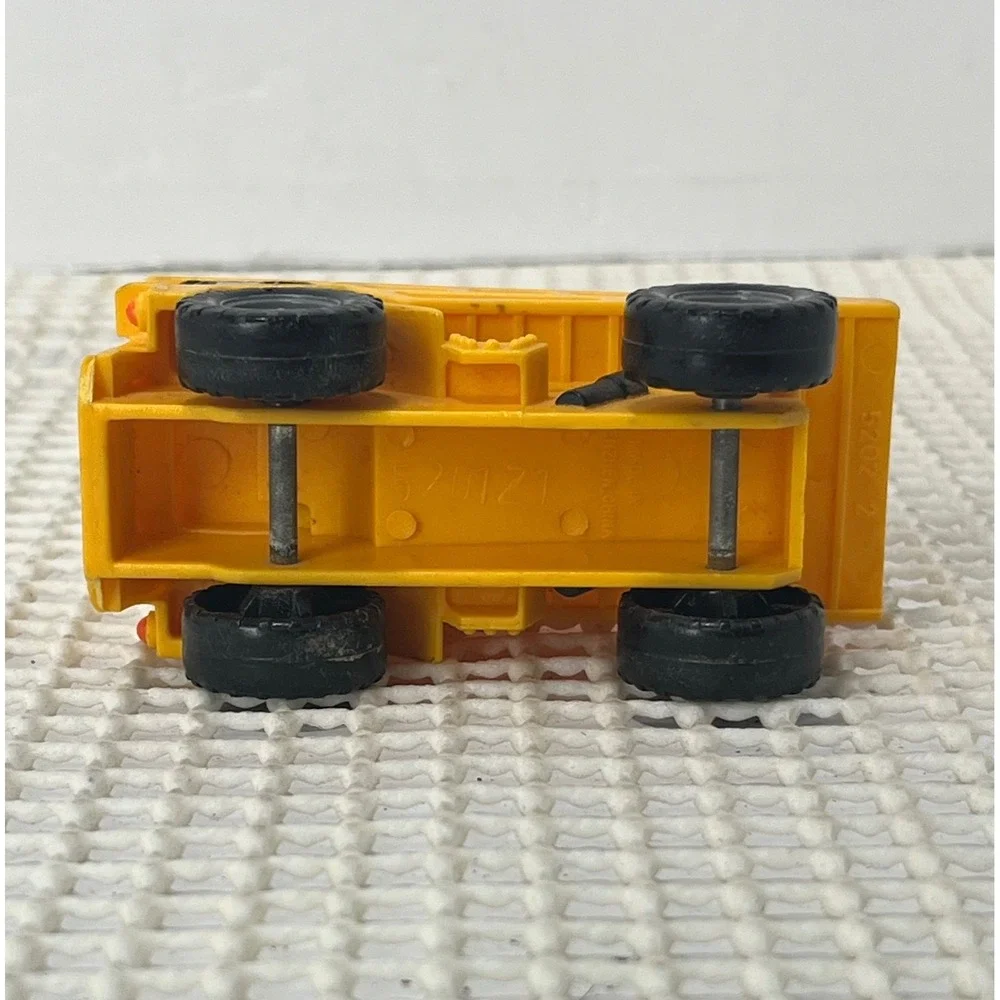 Vintage Plastic Caterpillar-CAT Diesel Power Yellow Construction Dump Truck